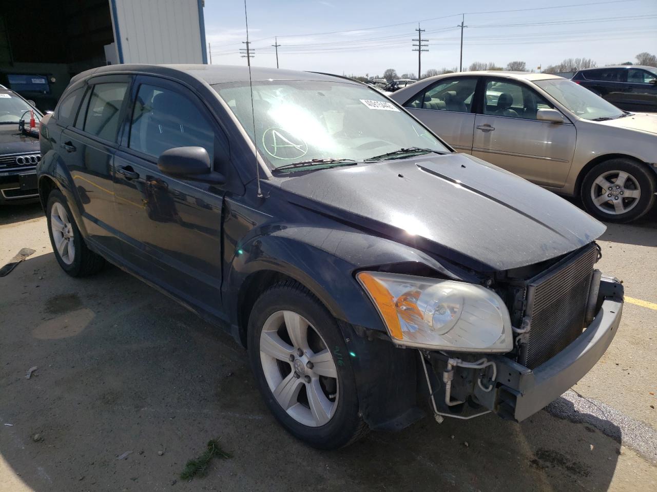 DODGE CALIBER MA 2011 with VIN 1B3CB3HA2BD211493 - Photo from auction