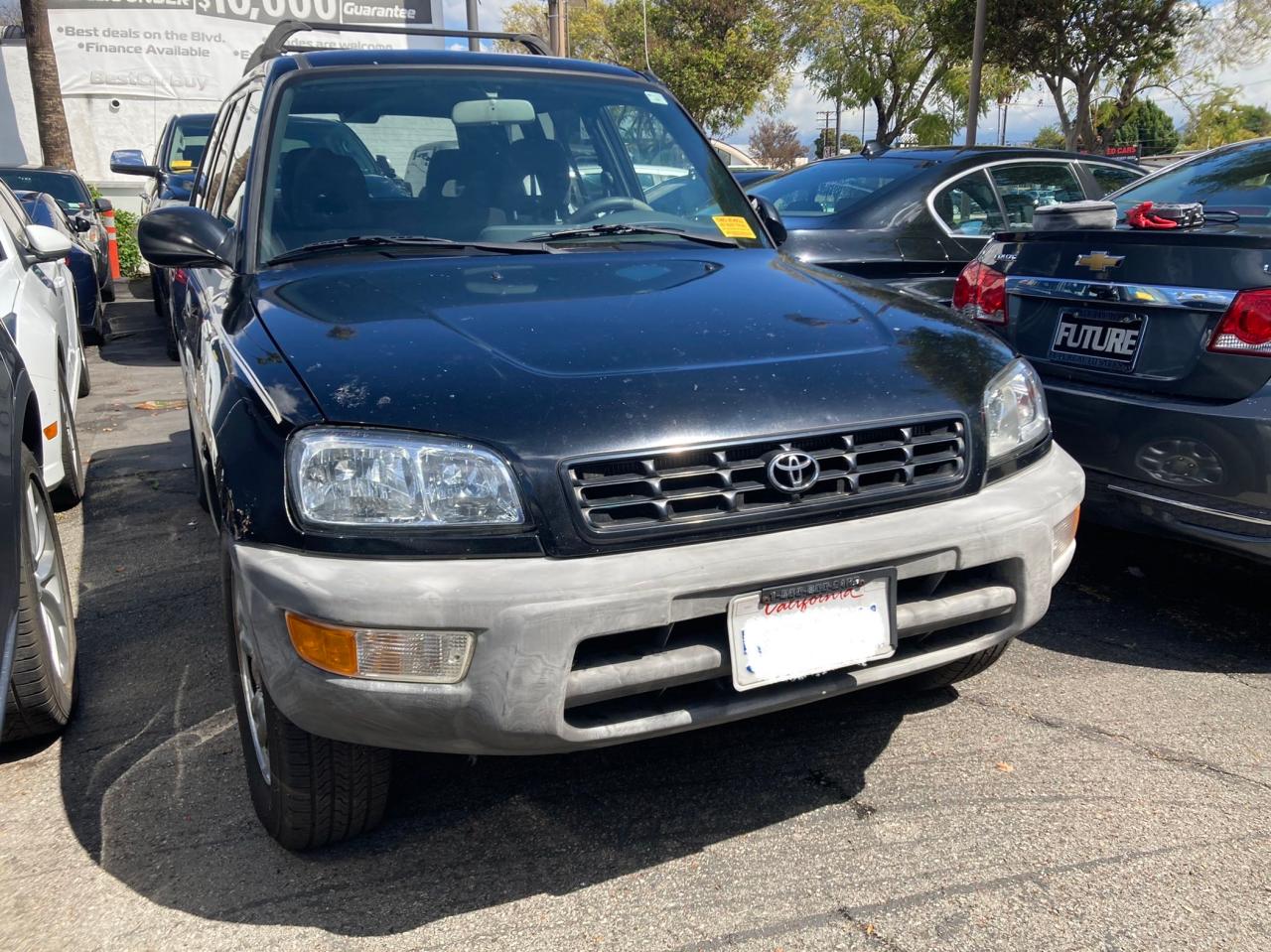 TOYOTA RAV4 1999 with VIN JT3GP10V6X0039301 - Photo from auction