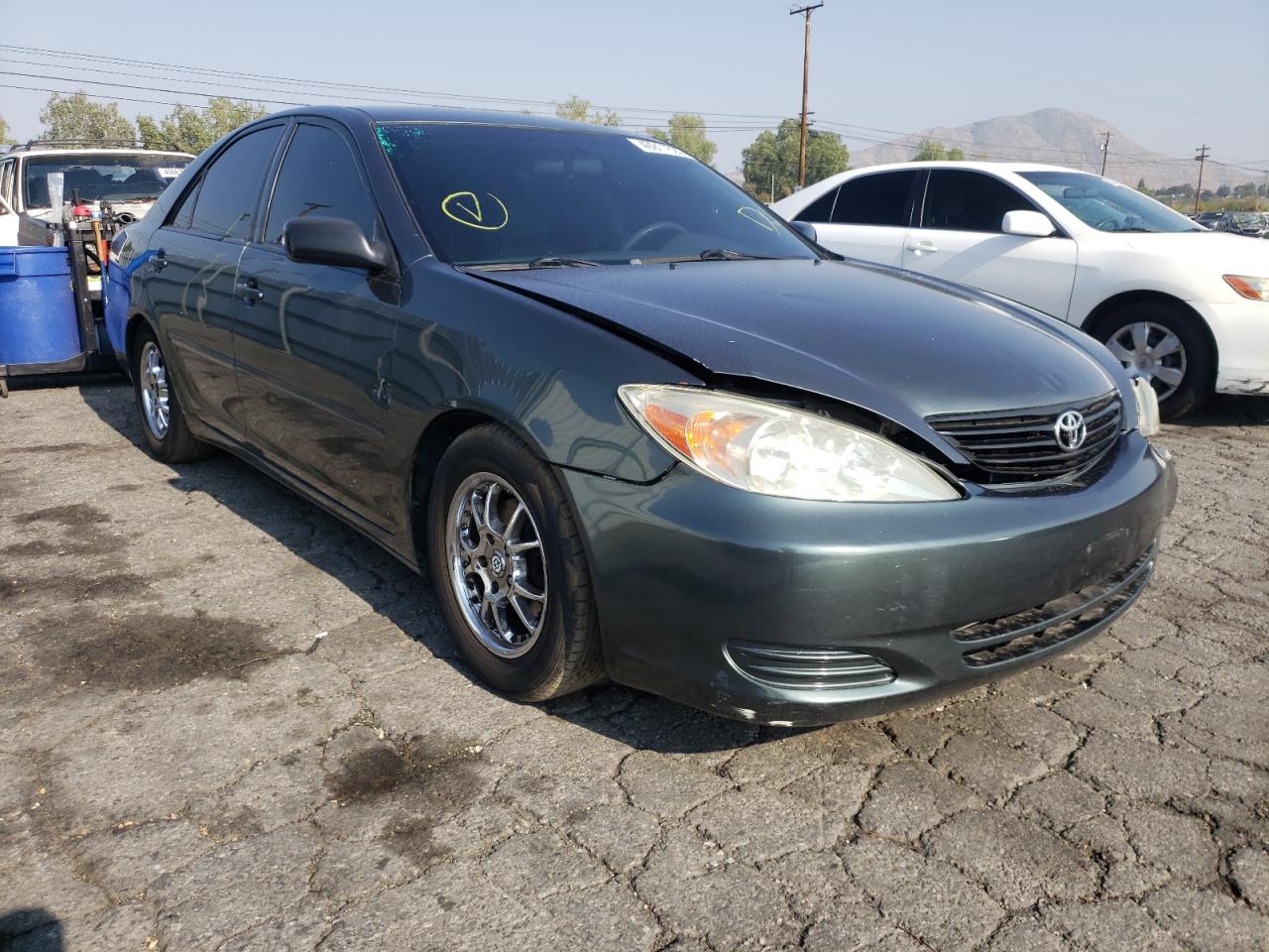 TOYOTA CAMRY LE 2002 with VIN 4T1BF30K72U500819 - Photo from auction