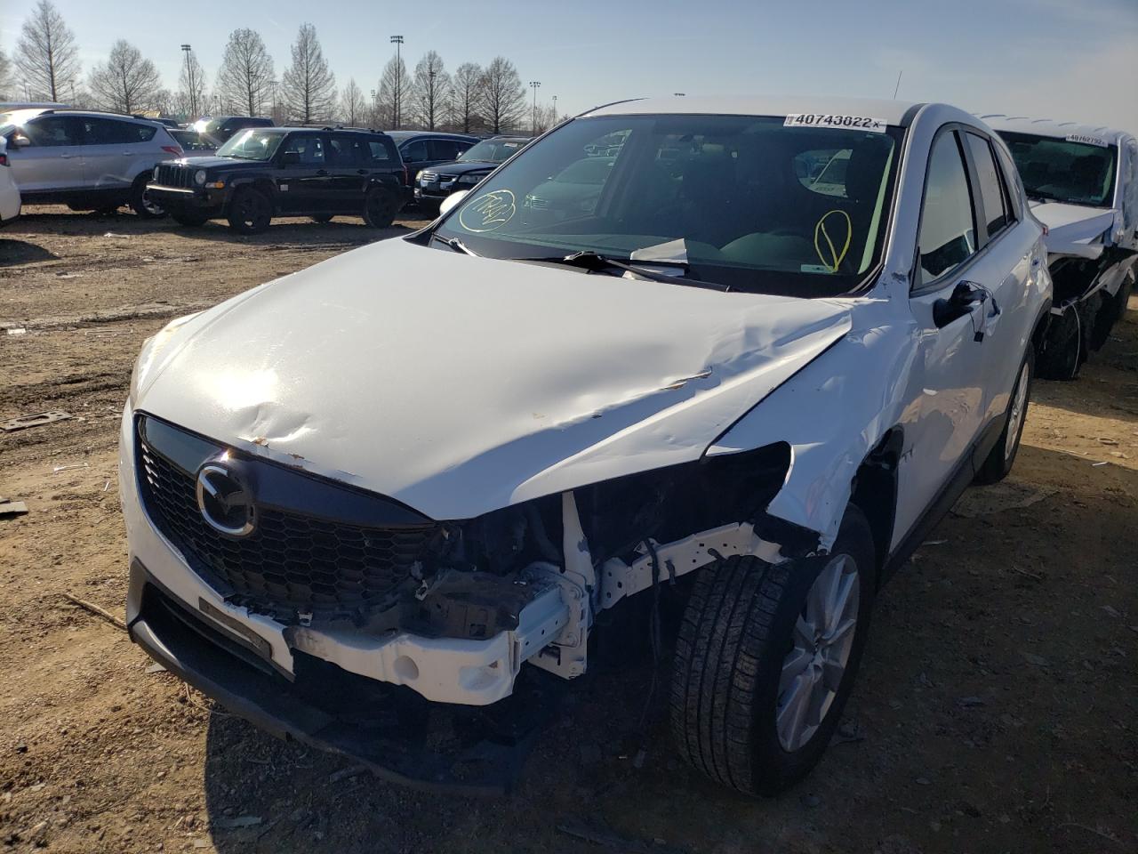 Photo 2 from auction – 2014 MAZDA CX-5 TOURI with VIN JM3KE4CYXE0371054