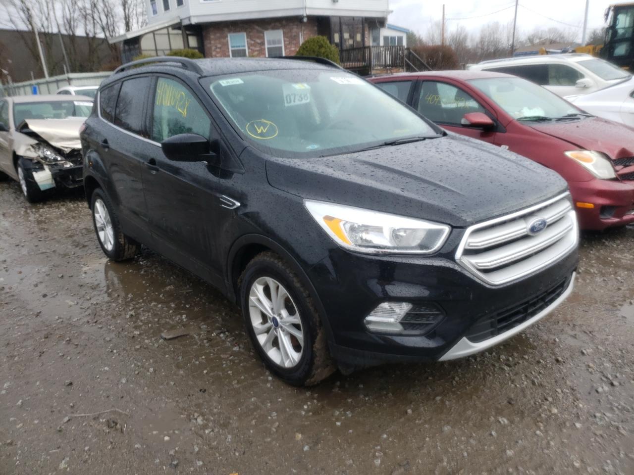 FORD ESCAPE SE 2018 with VIN 1FMCU0GD5JUA20843 - Photo from auction
