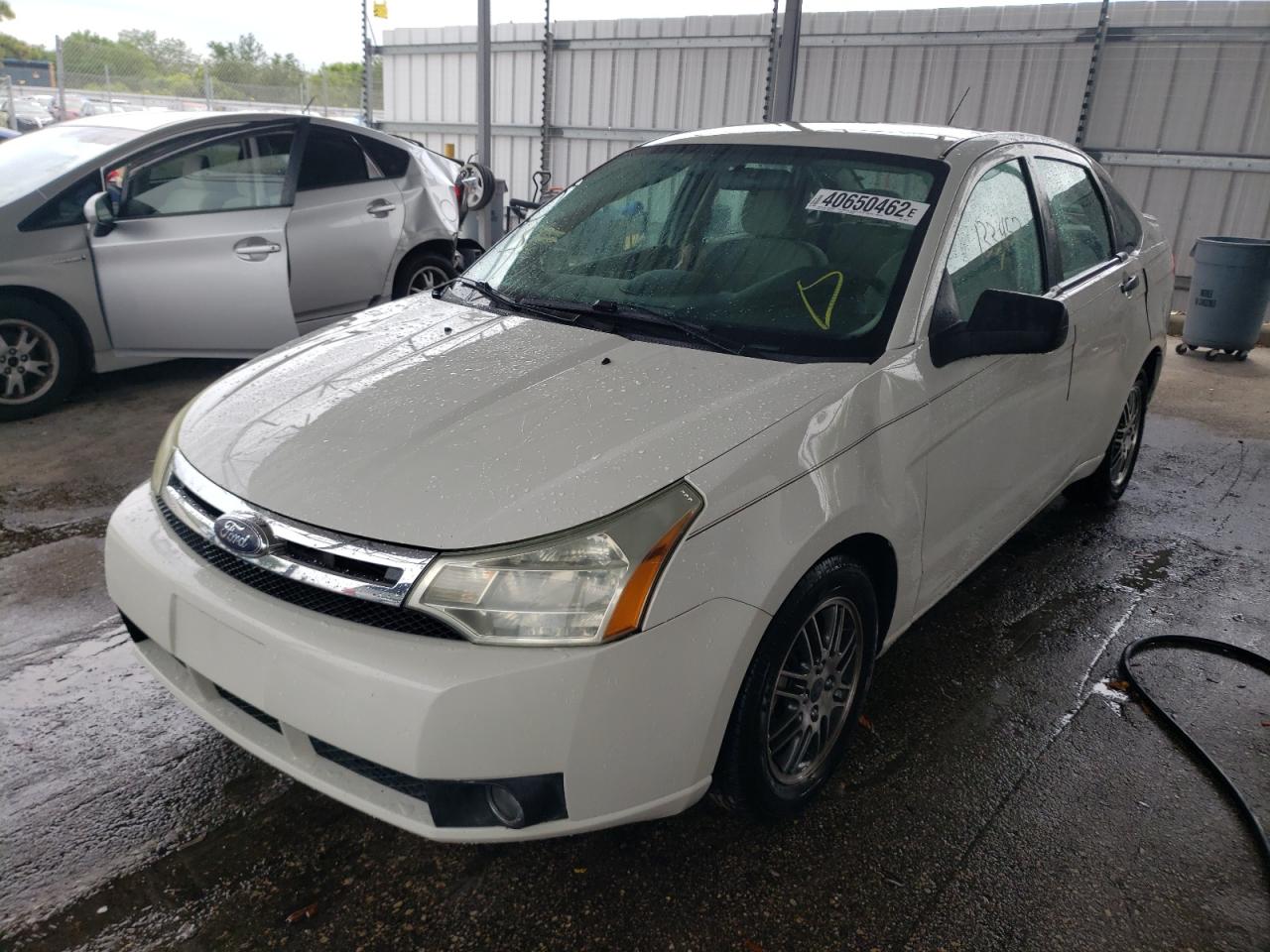 Photo 2 from auction – 2010 FORD FOCUS SE with VIN 1FAHP3FN0AW196352