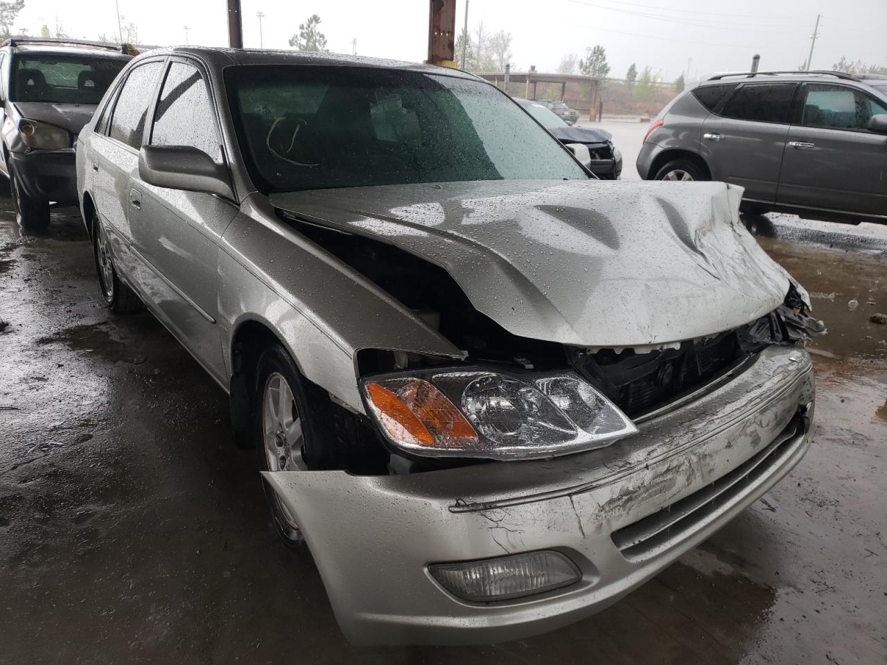 TOYOTA AVALON XL 2000 with VIN 4T1BF28B7YU098565 - Photo from auction