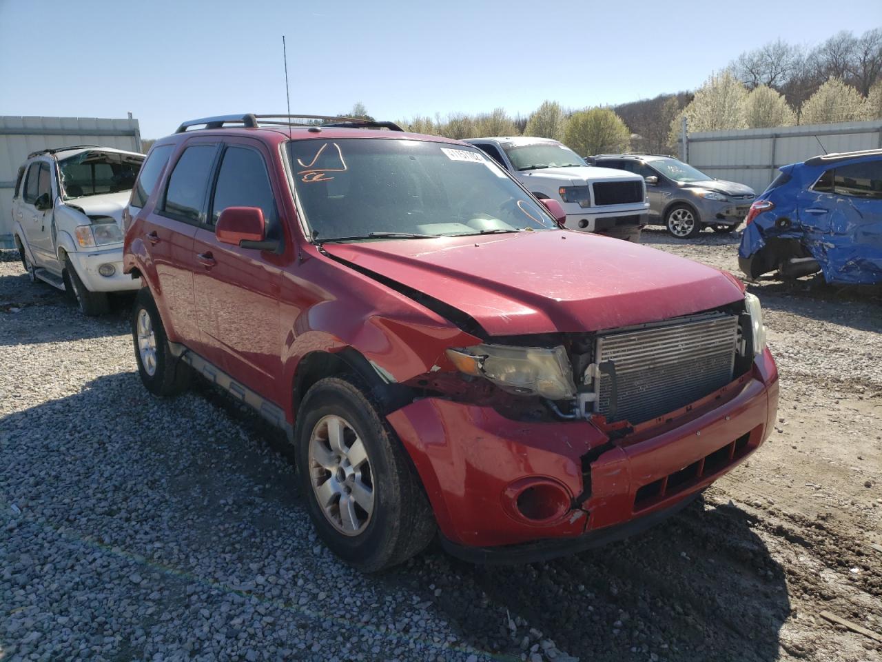 FORD ESCAPE LIM 2010 with VIN 1FMCU9E75AKD21030 - Photo from auction