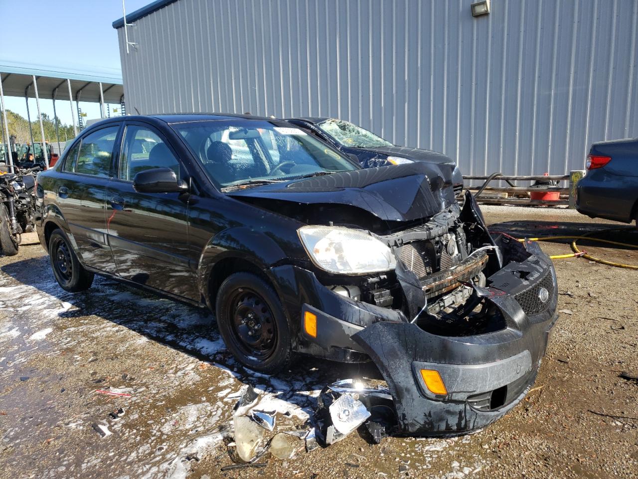 KIA RIO BASE 2009 with VIN KNADE223696553393 - Photo from auction