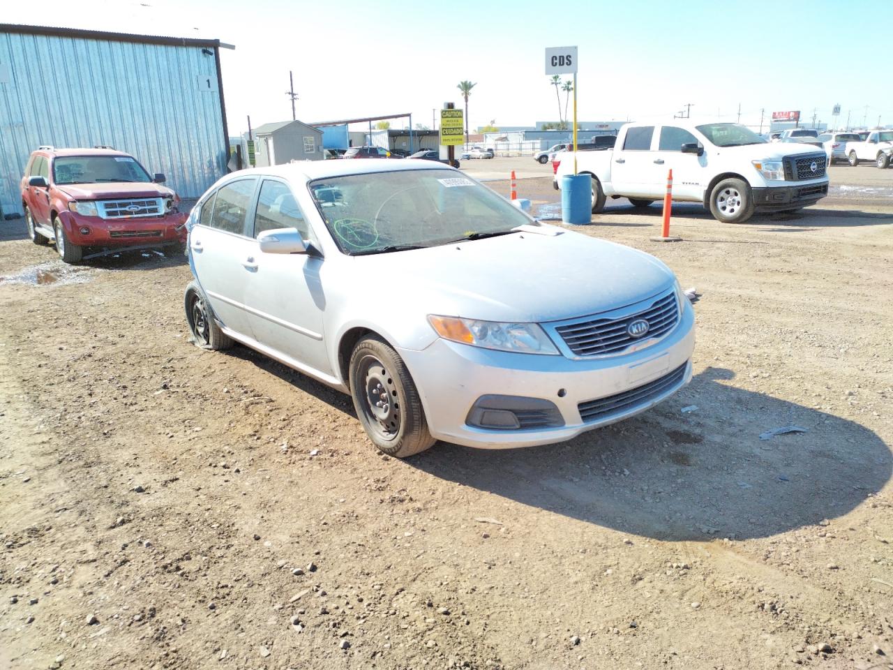 KIA OPTIMA LX 2010 with VIN KNAGG4A87A5454253 - Photo from auction
