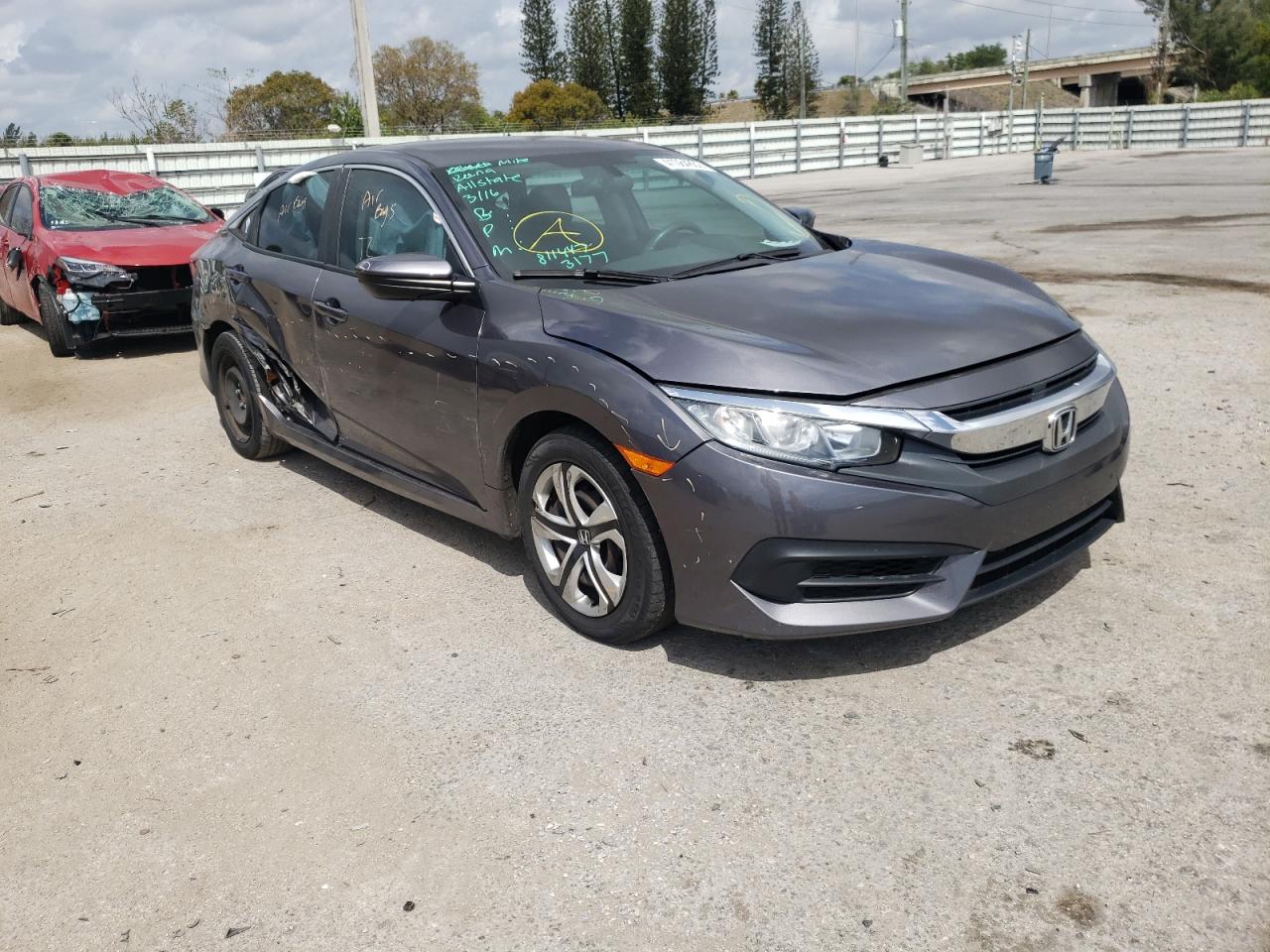 HONDA CIVIC LX 2017 with VIN 19XFC2F52HE041099 - Photo from auction