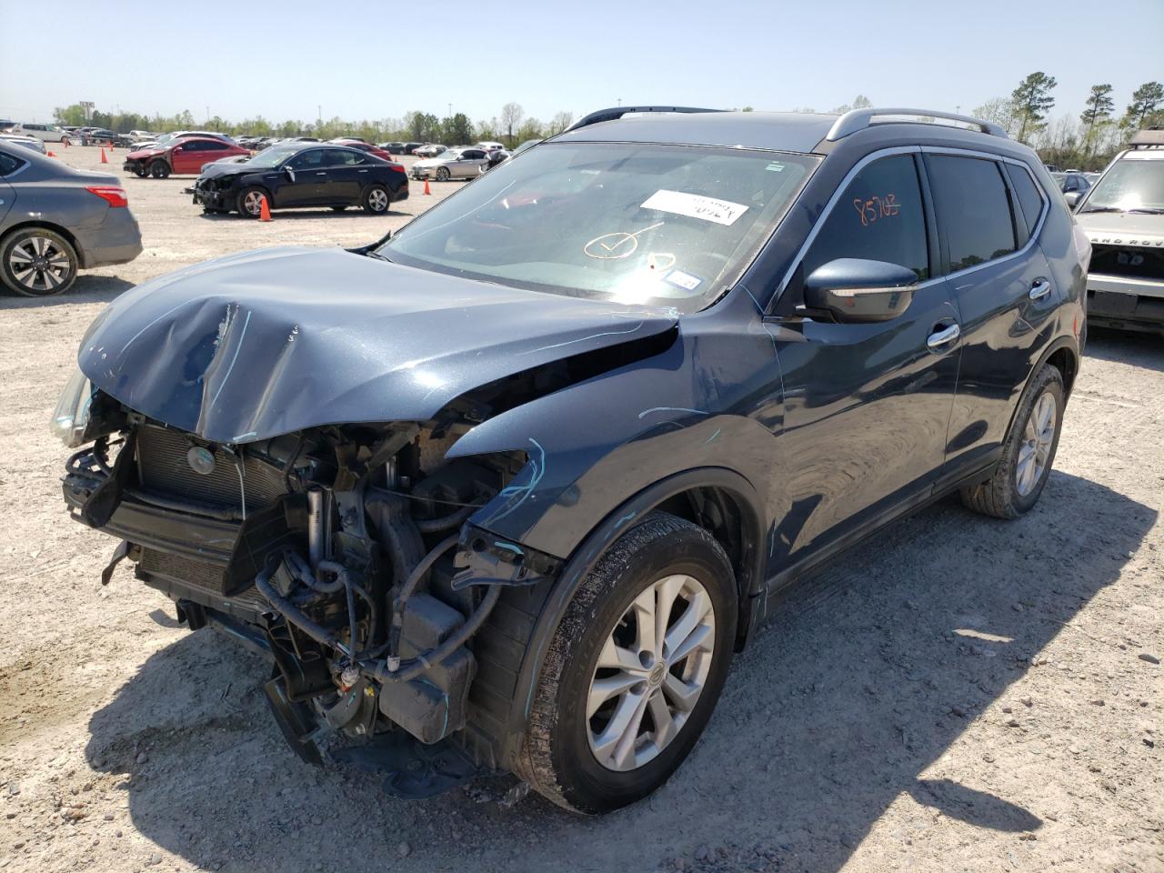 Photo 2 from auction – 2015 NISSAN ROGUE S with VIN 5N1AT2MT9FC785553