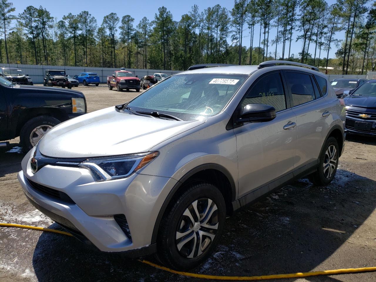 Photo 2 from auction – 2018 TOYOTA RAV4 LE with VIN 2T3ZFREV6JW417523