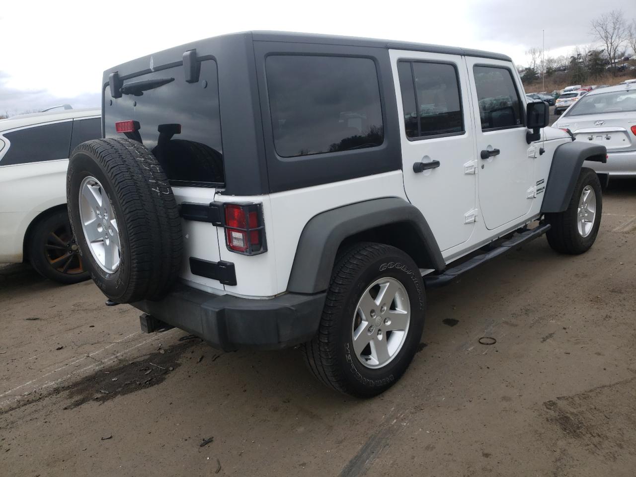 Photo 4 from auction – 2011 JEEP WRANGLER U with VIN 1J4BA3H1XBL553092