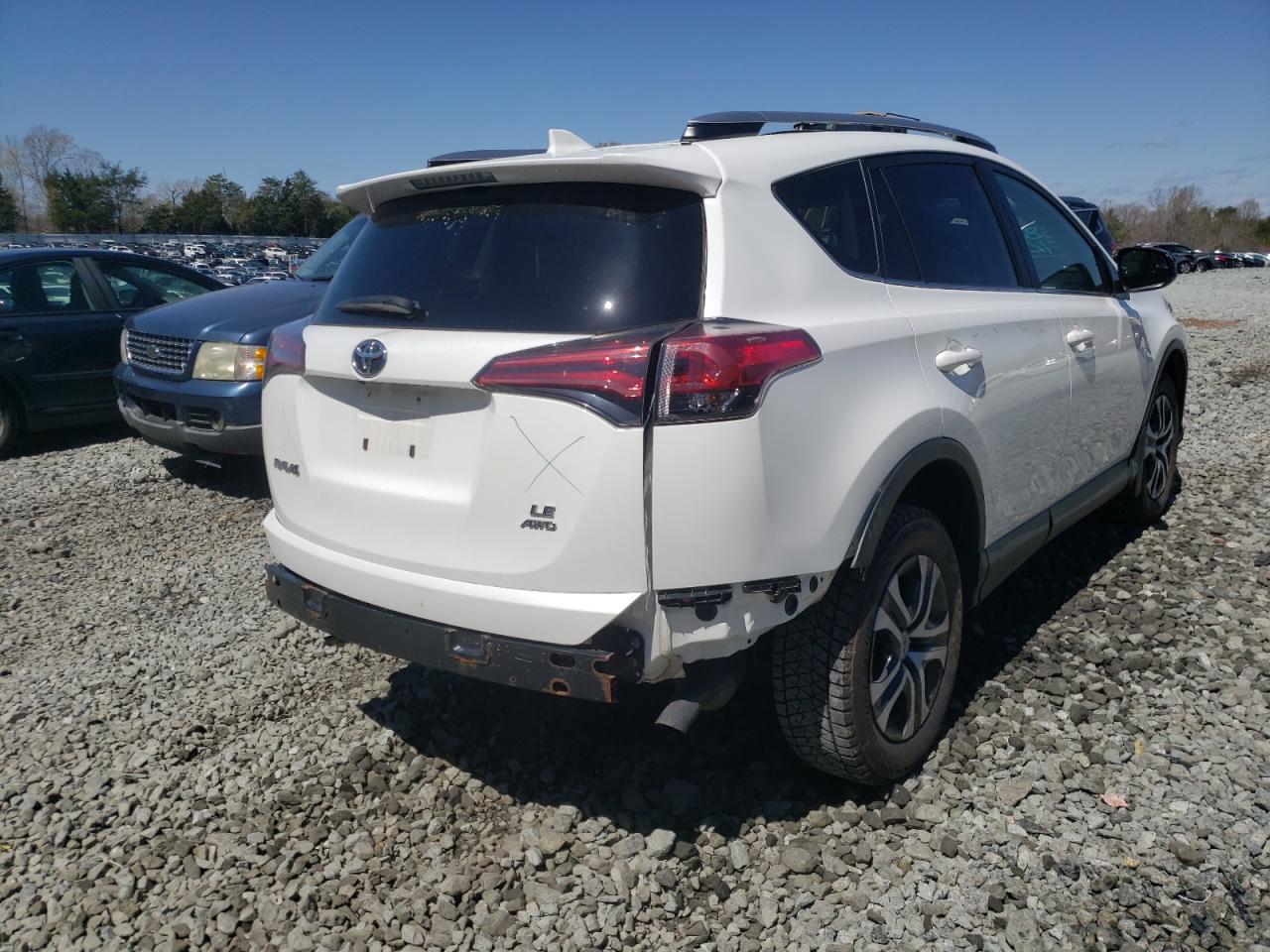 Photo 4 from auction – 2017 TOYOTA RAV4 LE with VIN JTMBFREV0HJ122153
