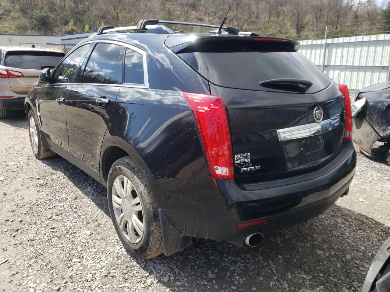 Photo 3 from auction – 2011 CADILLAC SRX LUXURY with VIN 3GYFNAEY5BS670892