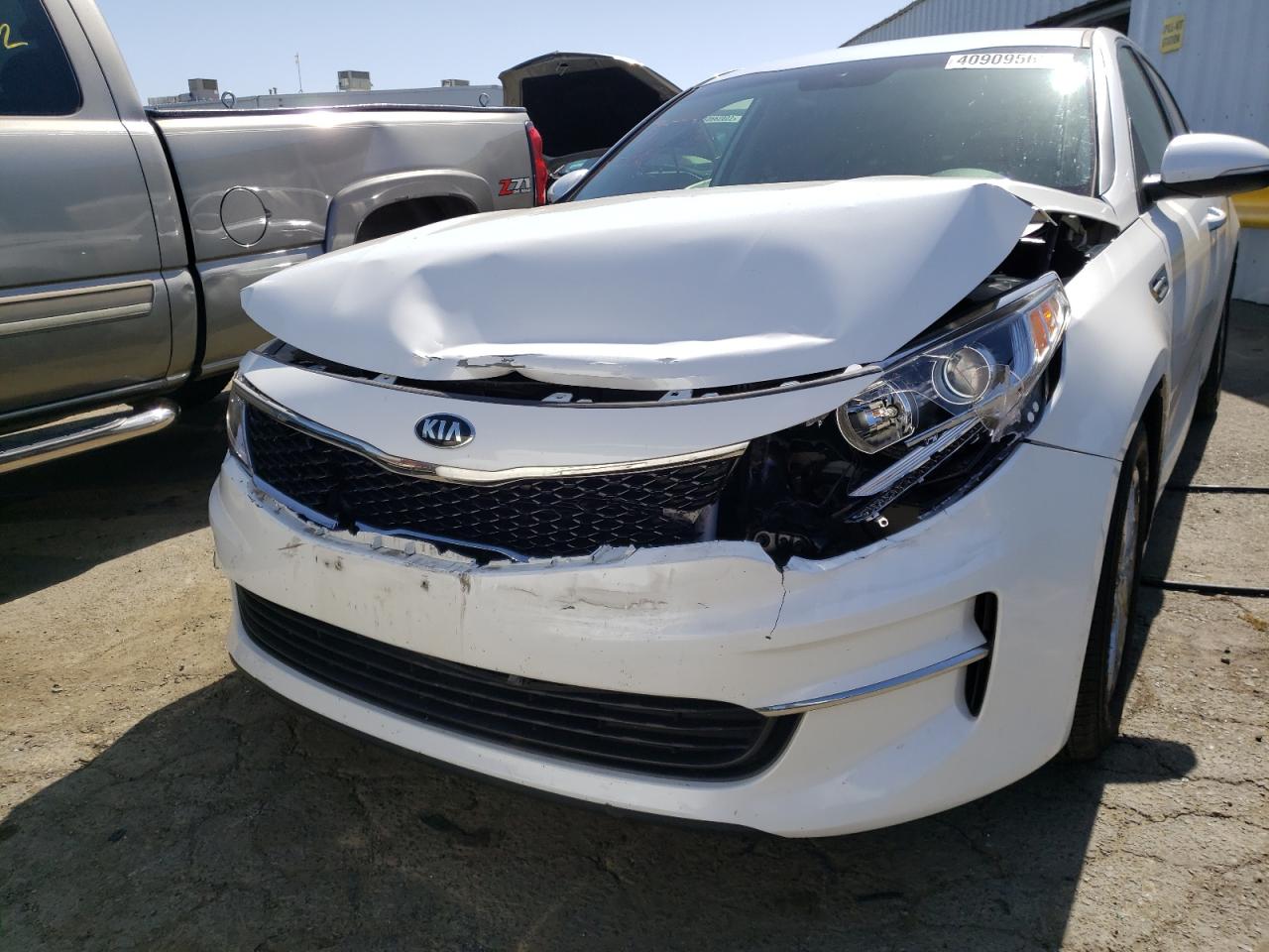 Photo 9 from auction – 2016 KIA OPTIMA LX with VIN KNAGT4L36G5117689