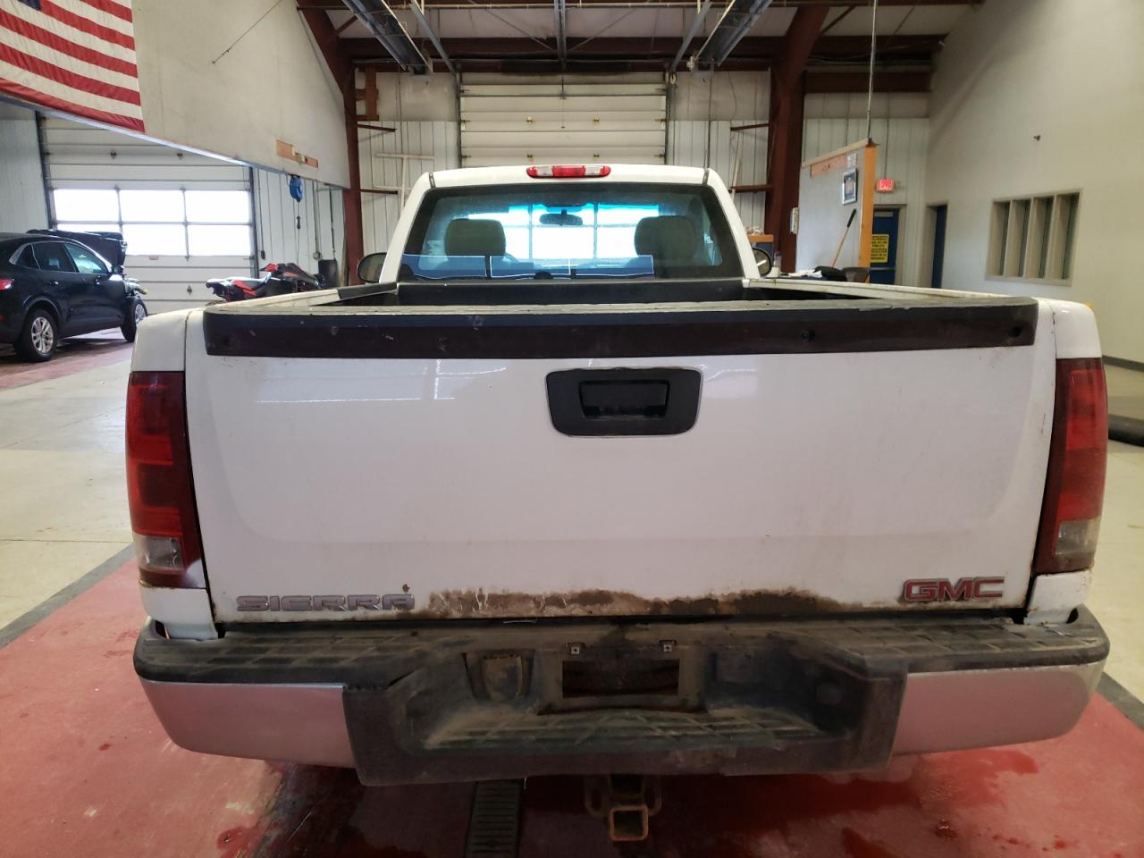Photo 6 from auction – 2012 GMC SIERRA K15 with VIN 1GTN2TEX9CZ325527