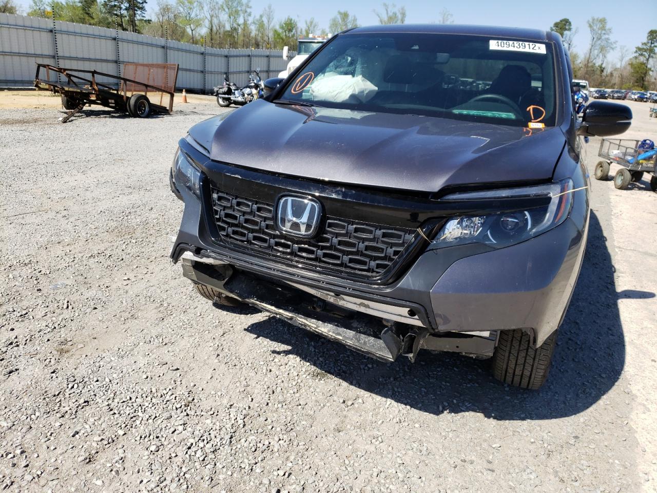 Photo 9 from auction – 2021 HONDA PASSPORT E with VIN 5FNYF8H53MB005216