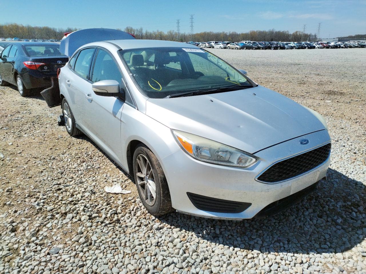 FORD FOCUS SE 2015 with VIN 1FADP3F29FL250373 - Photo from auction