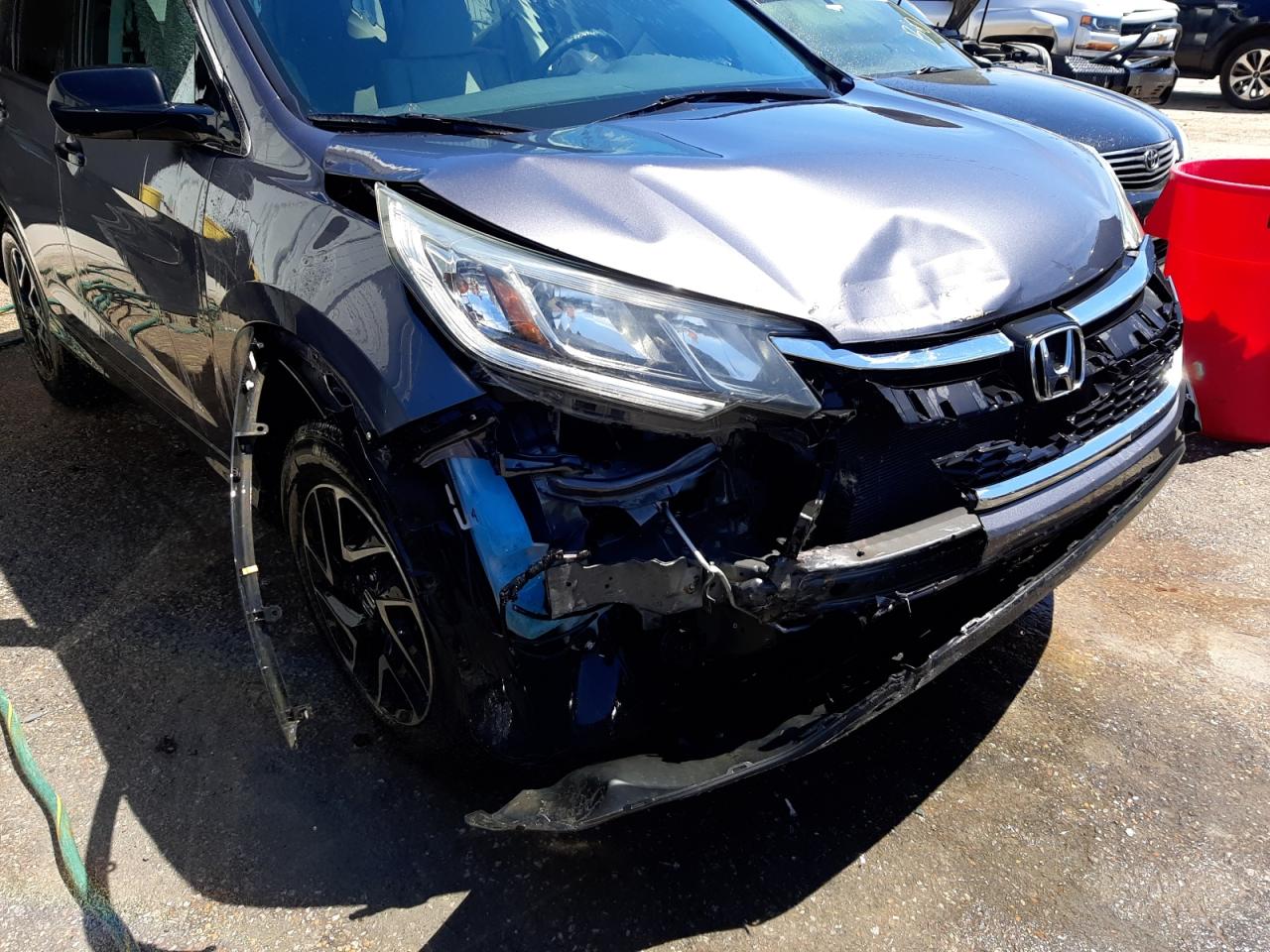 Photo 9 from auction – 2016 HONDA CR-V SE with VIN 2HKRM3H46GH514758