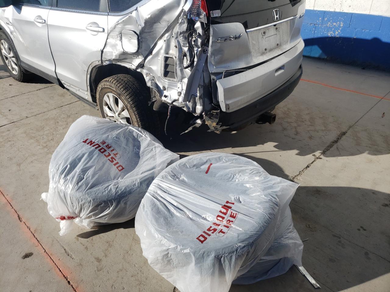 Photo 9 from auction – 2014 HONDA CR-V EXL with VIN 2HKRM4H79EH655787