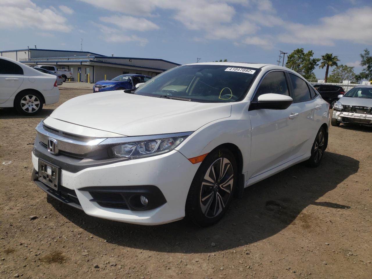 Photo 2 from auction – 2018 HONDA CIVIC EX with VIN JHMFC1F37JX040690