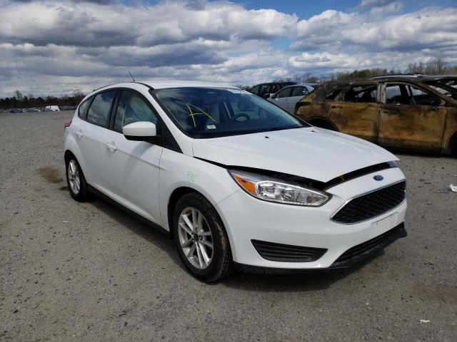 FORD FOCUS SE 2018 with VIN 1FADP3K24JL212497 - Photo from auction