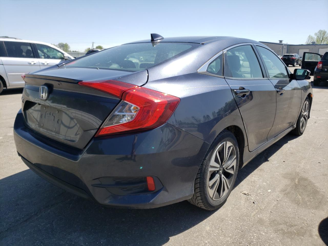 Photo 4 from auction – 2016 HONDA CIVIC EXL with VIN 19XFC1F77GE018184