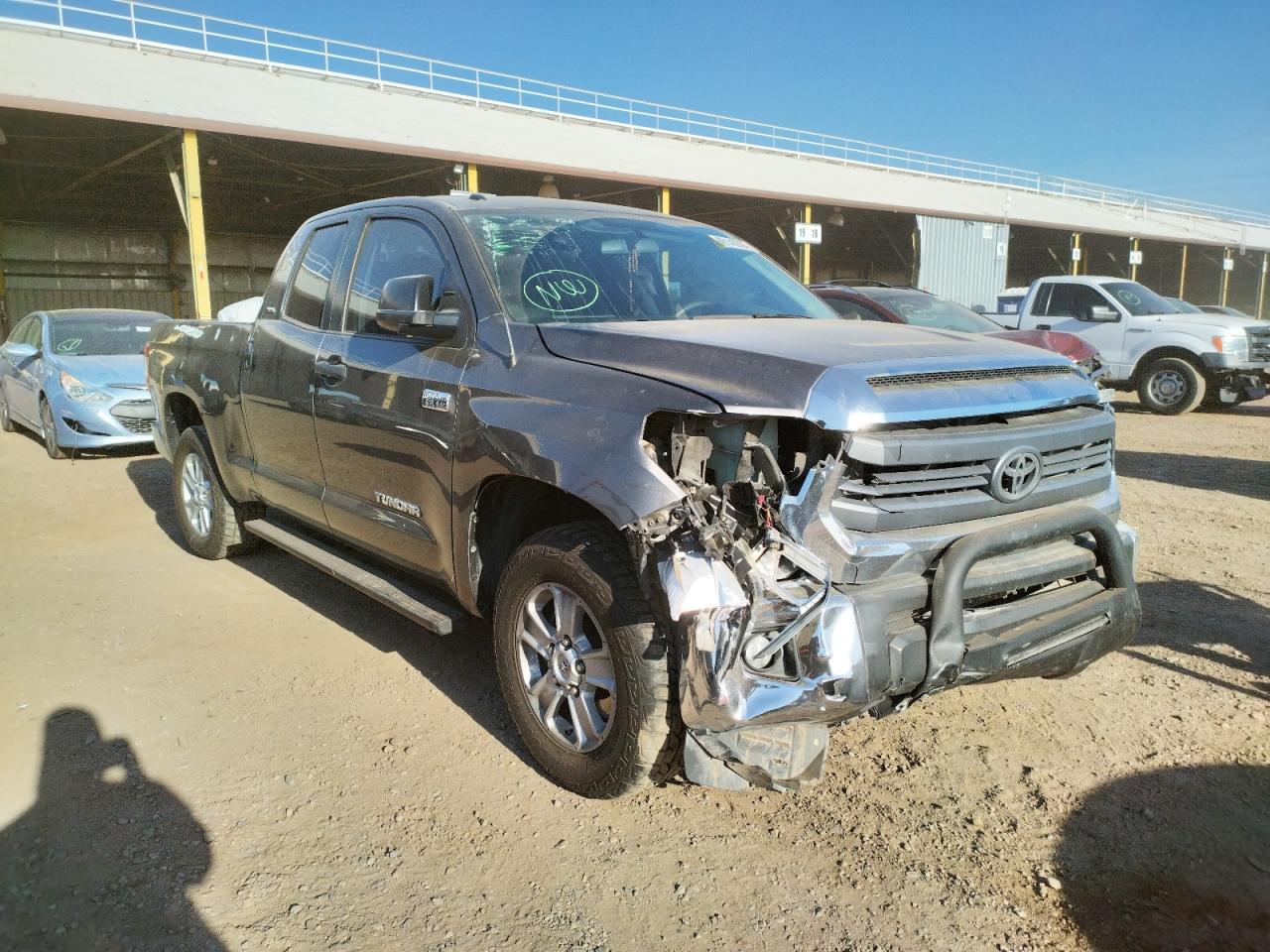 TOYOTA TUNDRA DOU 2014 with VIN 5TFRY5F15EX161827 - Photo from auction