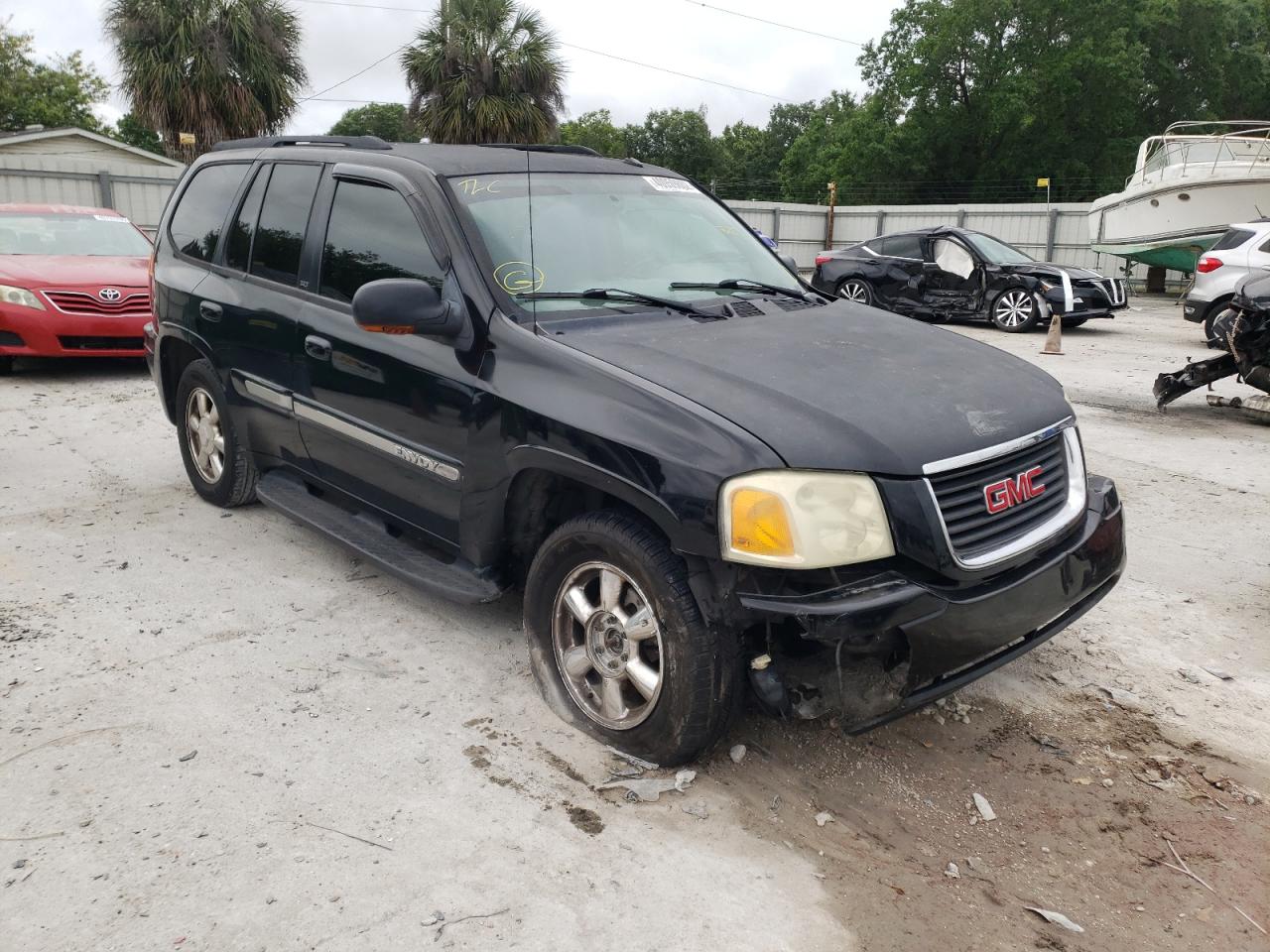 GMC ENVOY 2004 with VIN 1GKDT13S142320101 - Photo from auction