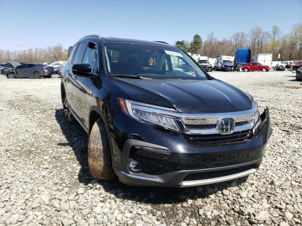 HONDA PILOT TOUR 2021 with VIN 5FNYF6H98MB012086 - Photo from auction