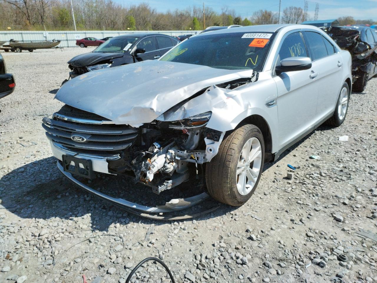 Photo 2 from auction – 2014 FORD TAURUS SEL with VIN 1FAHP2H83EG161418