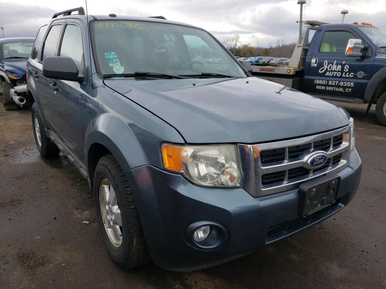 FORD ESCAPE XLT 2010 with VIN 1FMCU9D73AKC93892 - Photo from auction