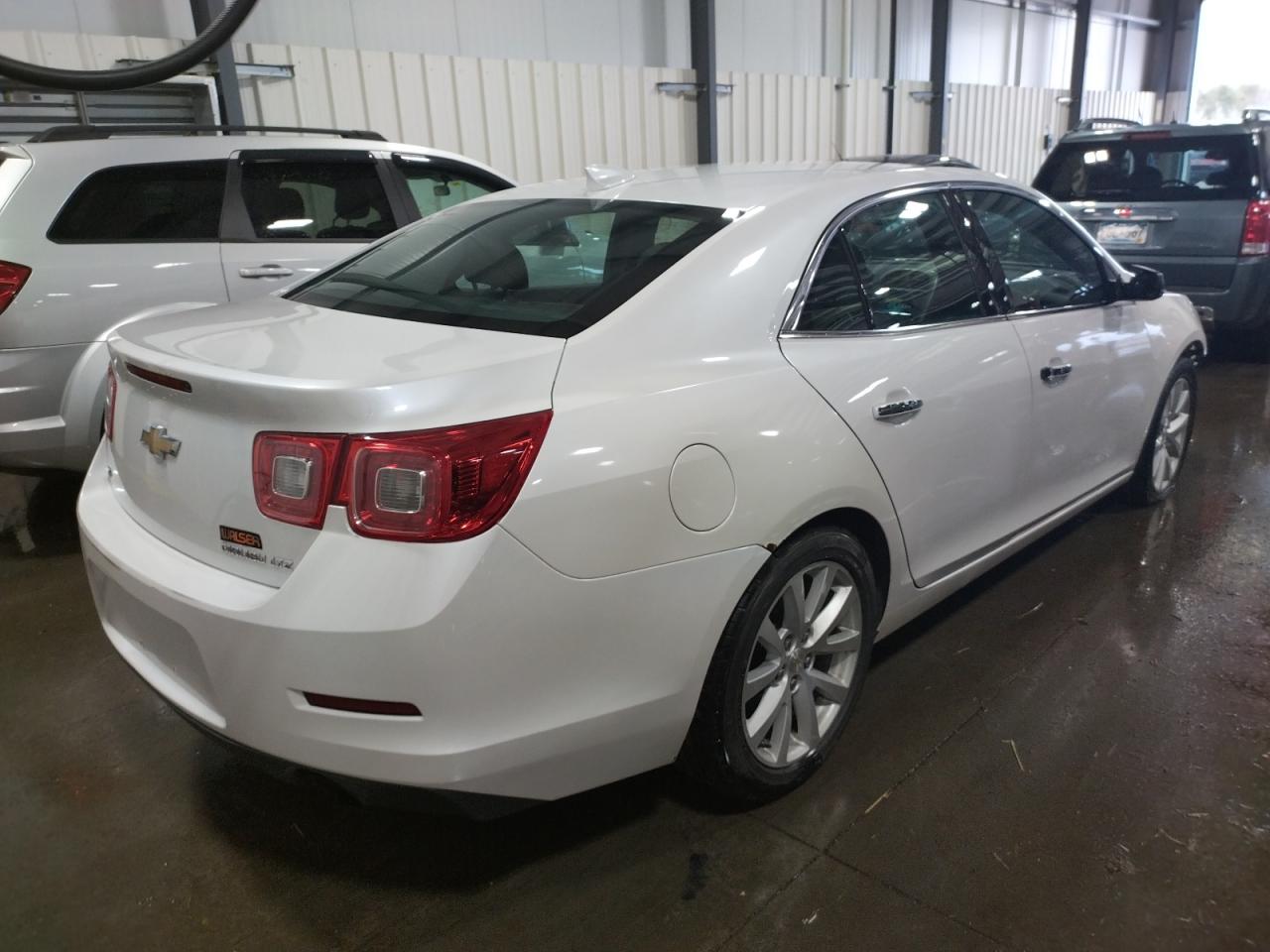 Photo 4 from auction – 2016 CHEVROLET MALIBU LIM with VIN 1G11E5SA2GF113585