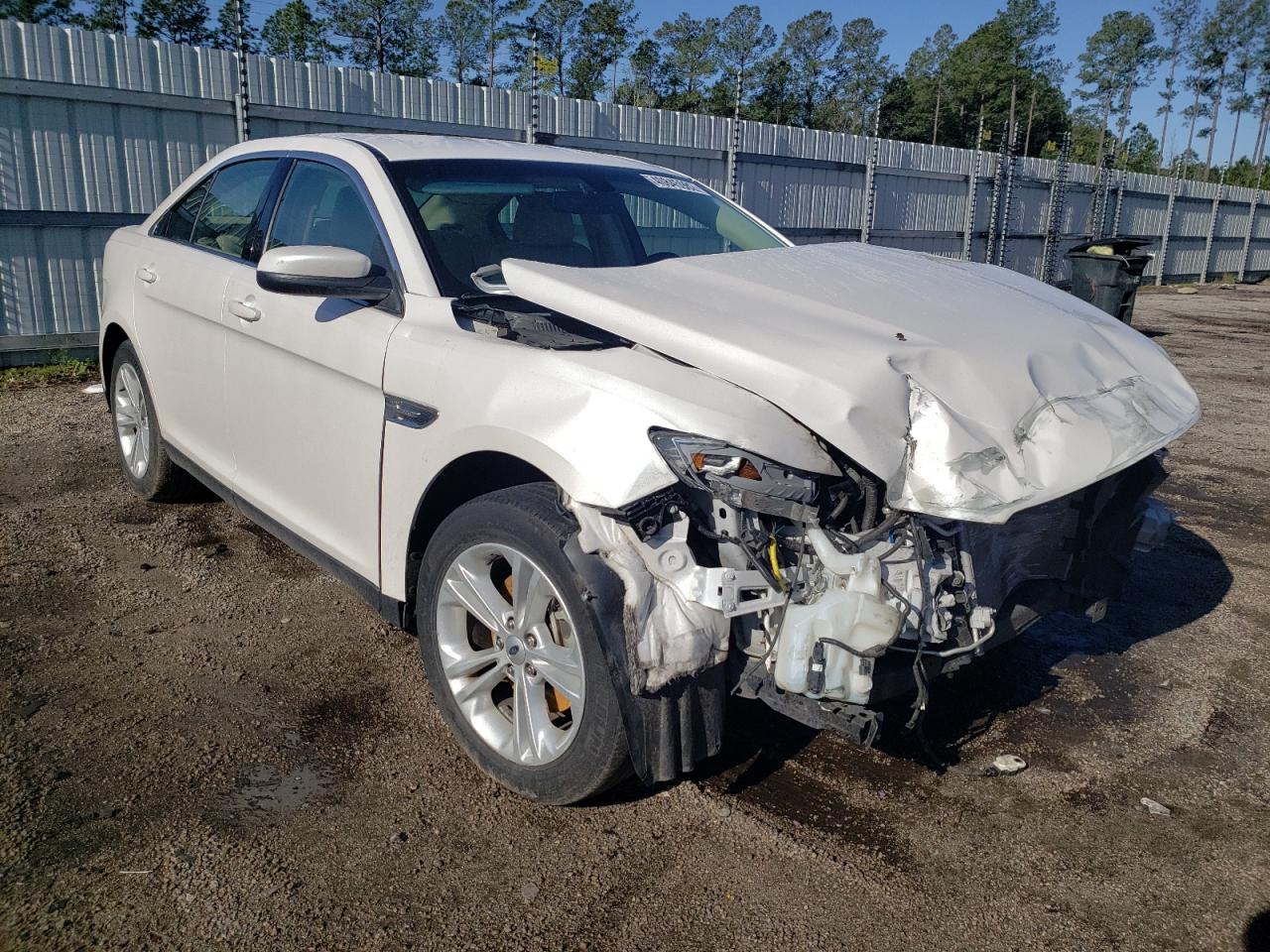 FORD TAURUS SEL 2014 with VIN 1FAHP2E8XEG132776 - Photo from auction