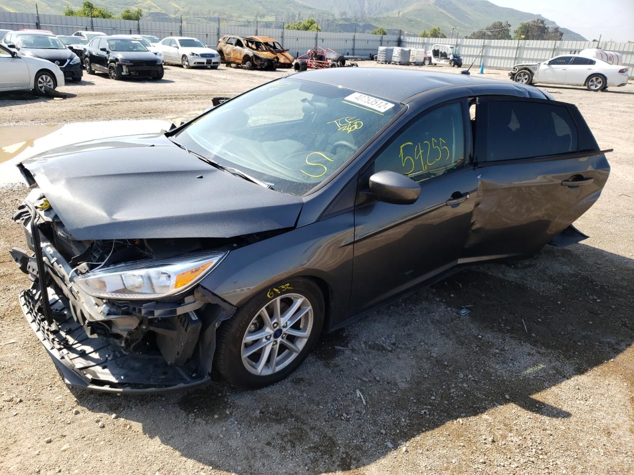 Photo 2 from auction – 2018 FORD FOCUS SE with VIN 1FADP3K28JL313395