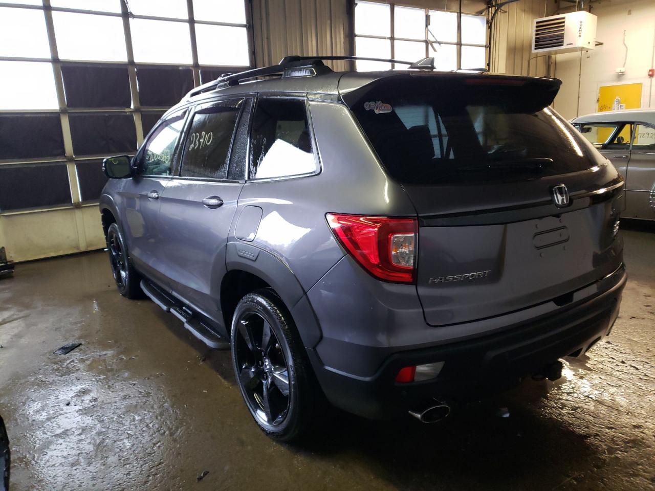 Photo 3 from auction – 2019 HONDA PASSPORT E with VIN 5FNYF8H05KB011195