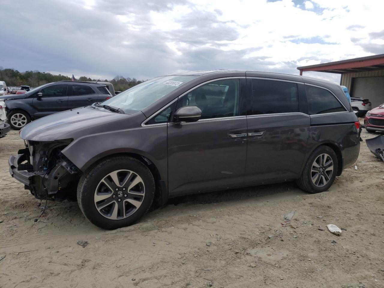 Photo 2 from auction – 2014 HONDA ODYSSEY TO with VIN 5FNRL5H94EB010862