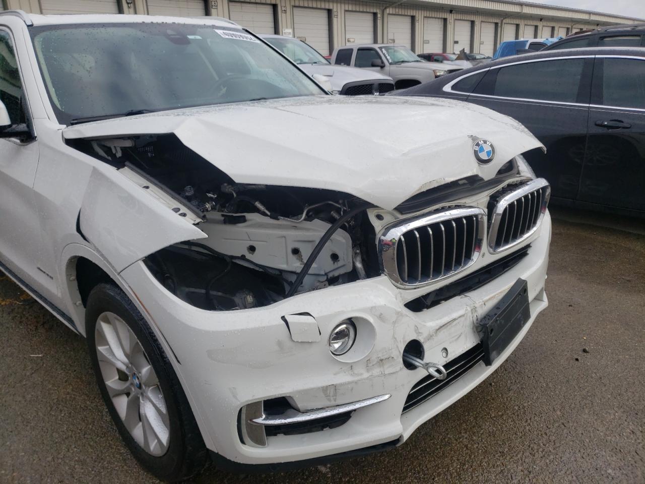 Photo 9 from auction – 2015 BMW X5 XDRIVE3 with VIN 5UXKR0C56F0K66913