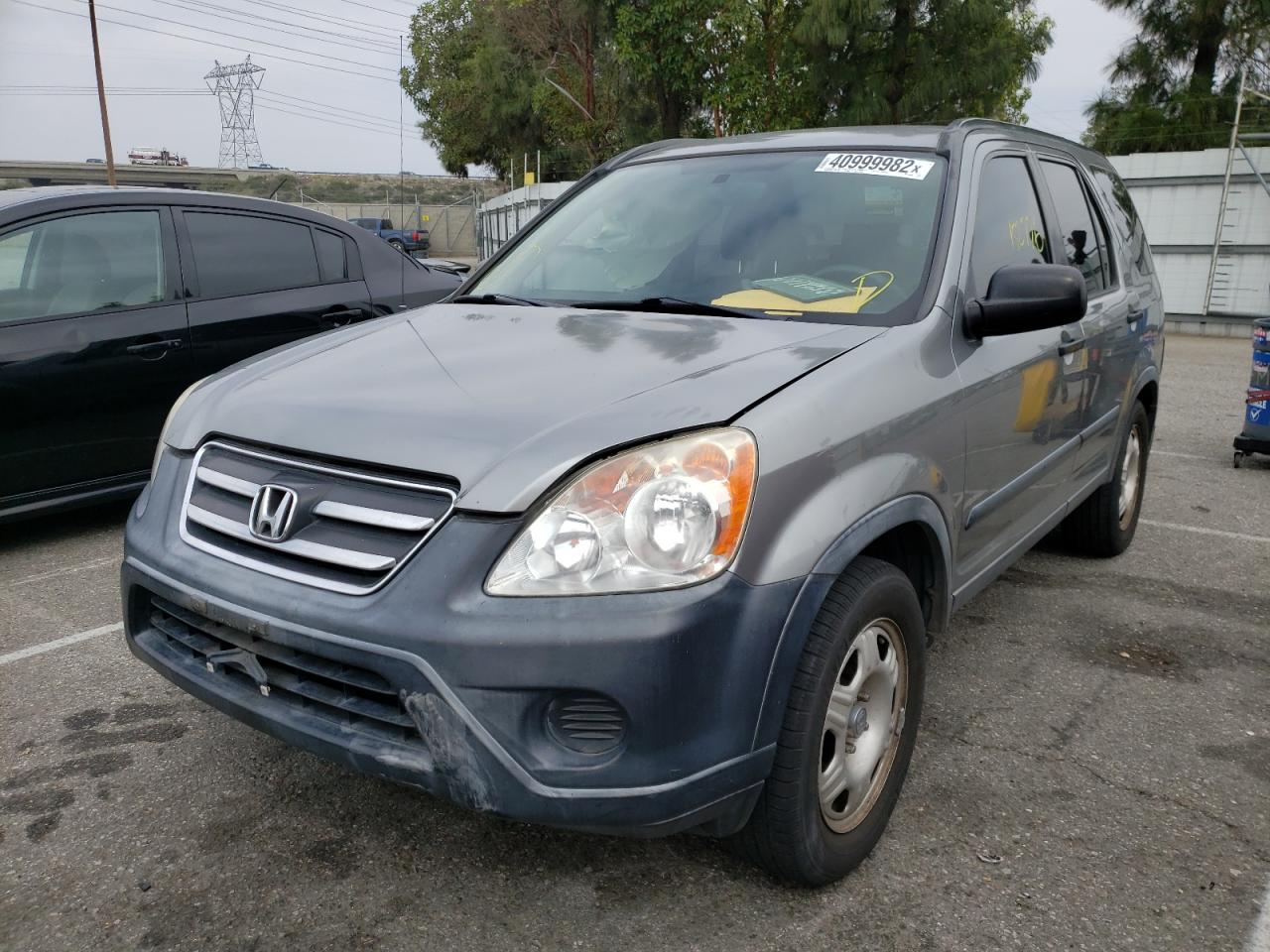 Photo 2 from auction – 2006 HONDA CR-V LX with VIN JHLRD68516C005958
