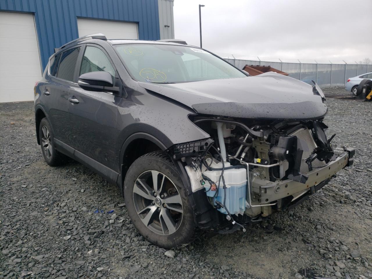 TOYOTA RAV4 LE 2018 with VIN 2T3BFREV4JW711293 - Photo from auction
