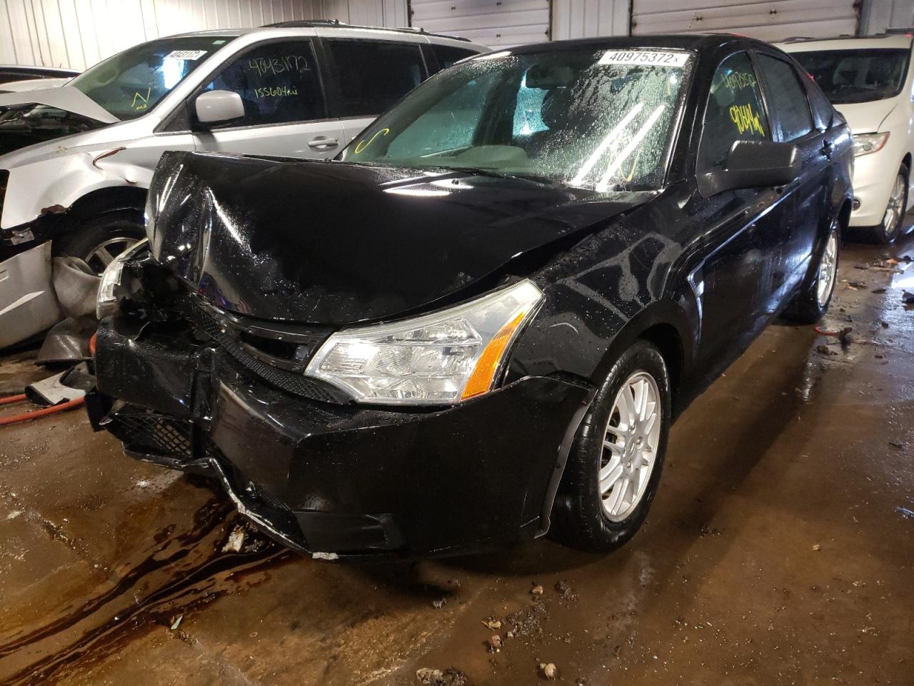 Photo 2 from auction – 2011 FORD FOCUS SE with VIN 1FAHP3FN2BW105499