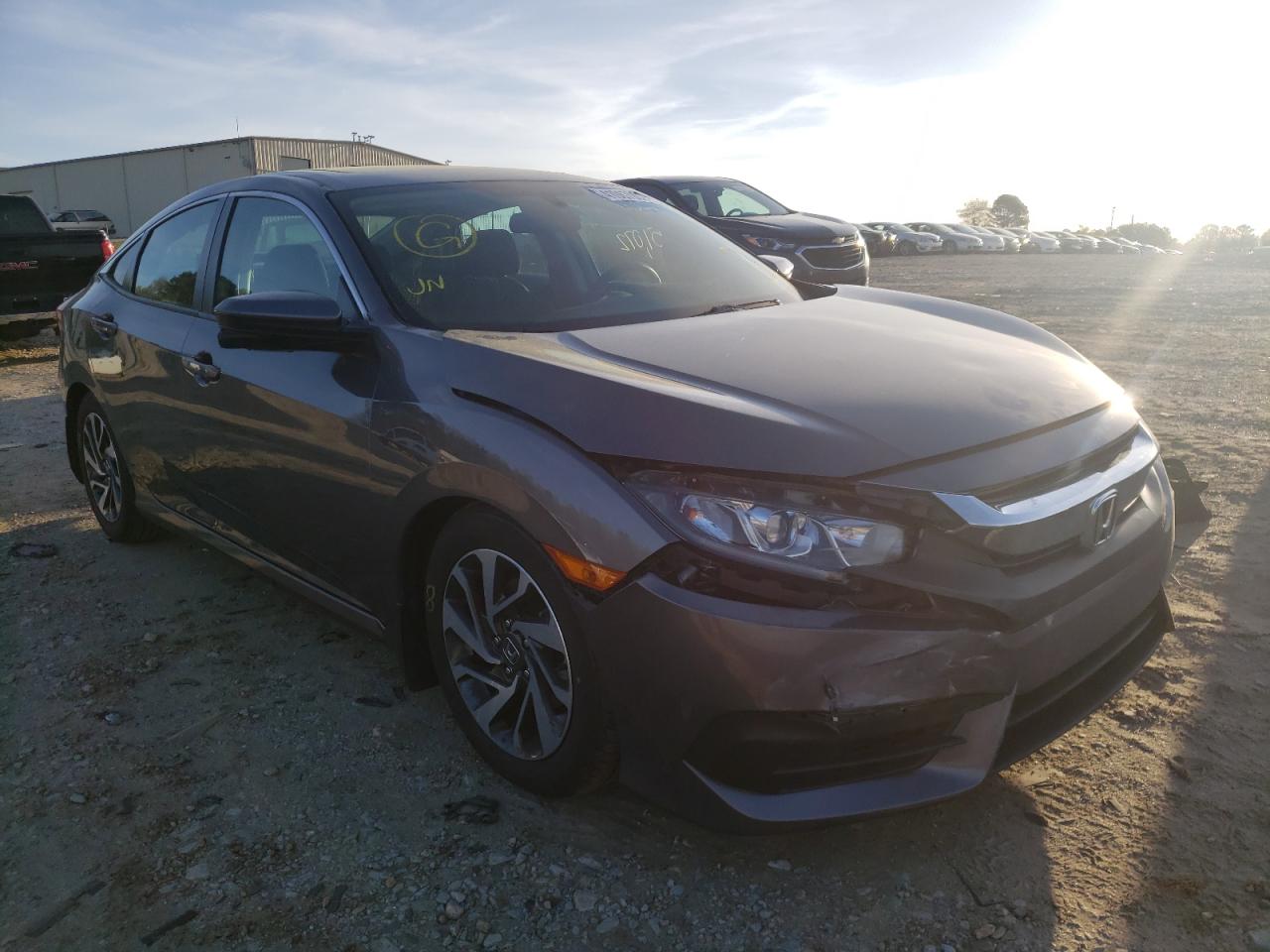 HONDA CIVIC EX 2017 with VIN 19XFC2F7XHE061392 - Photo from auction