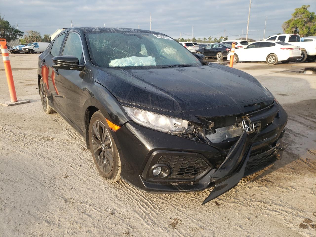 HONDA CIVIC EX 2018 with VIN SHHFK7H54JU233572 - Photo from auction