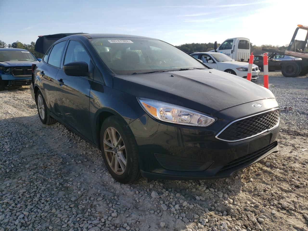 FORD FOCUS SE 2018 with VIN 1FADP3F29JL265190 - Photo from auction