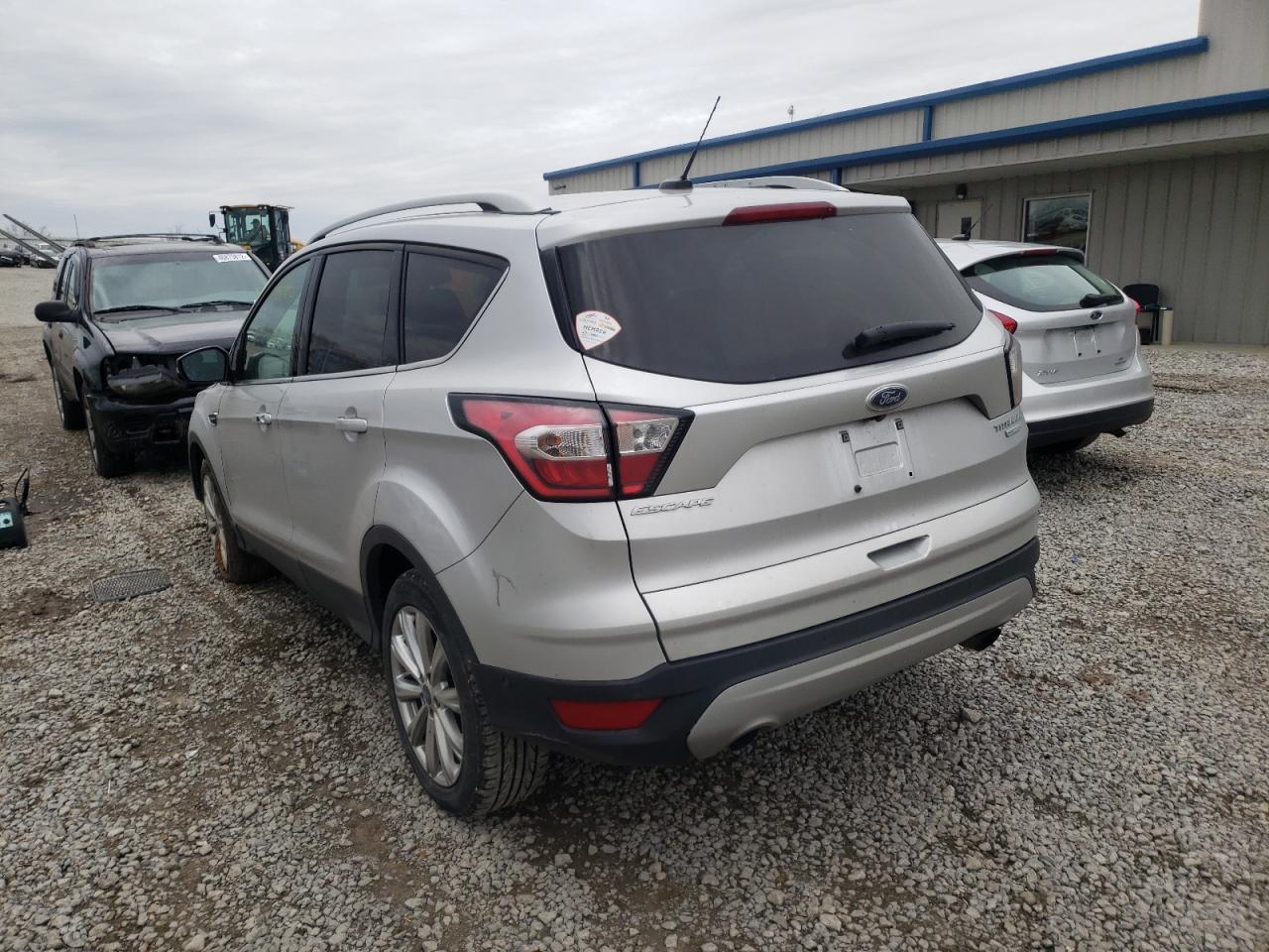 Photo 3 from auction – 2017 FORD ESCAPE TIT with VIN 1FMCU0JD4HUE06690
