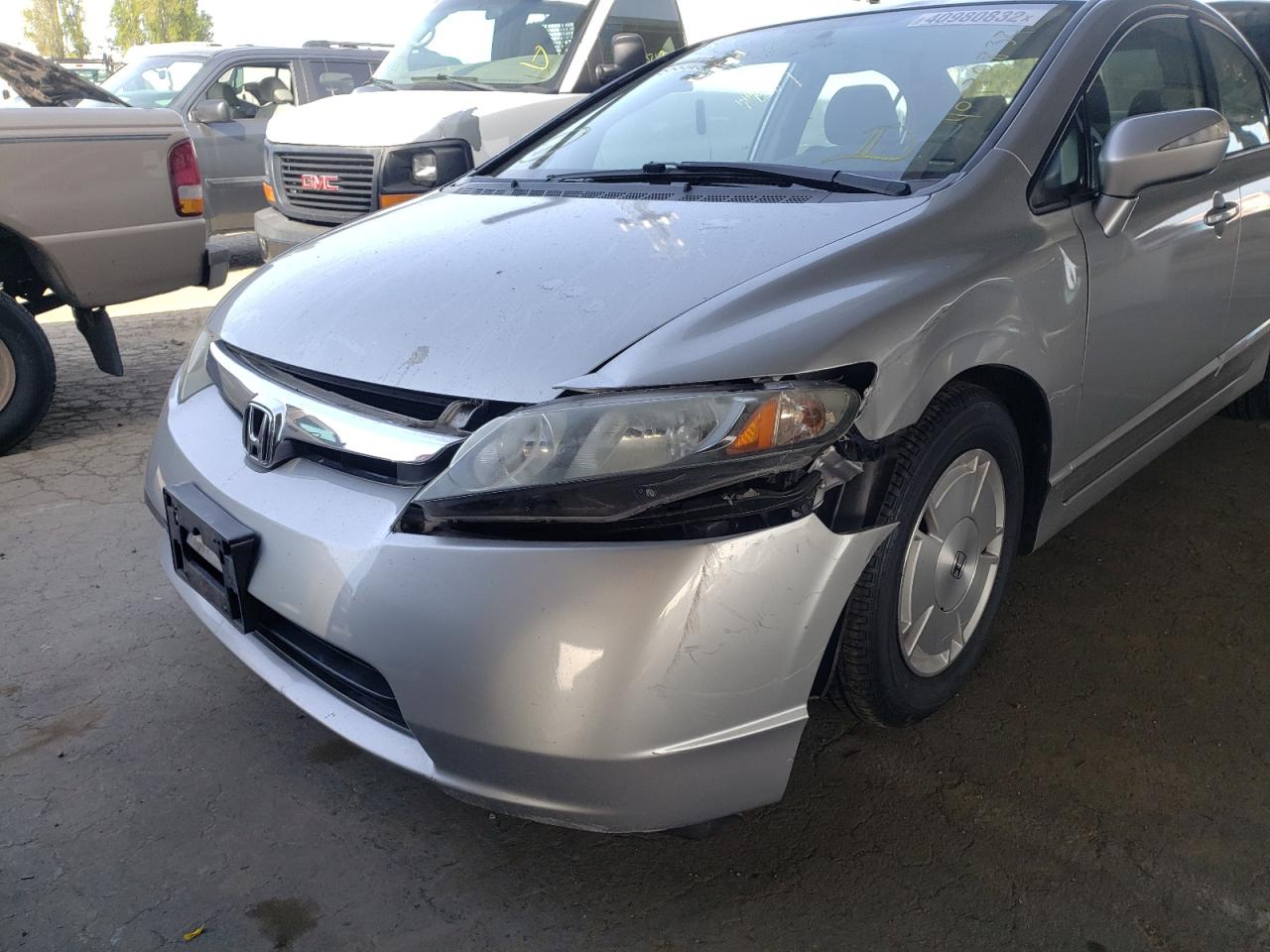 Photo 9 from auction – 2006 HONDA CIVIC HYBR with VIN JHMFA36206S014722