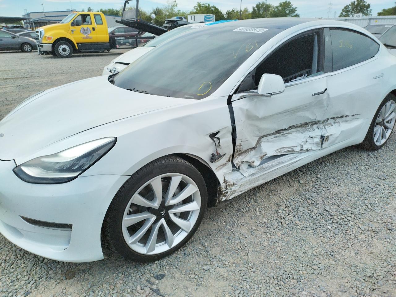 Photo 9 from auction – 2019 TESLA MODEL 3 with VIN 5YJ3E1EB7KF390341