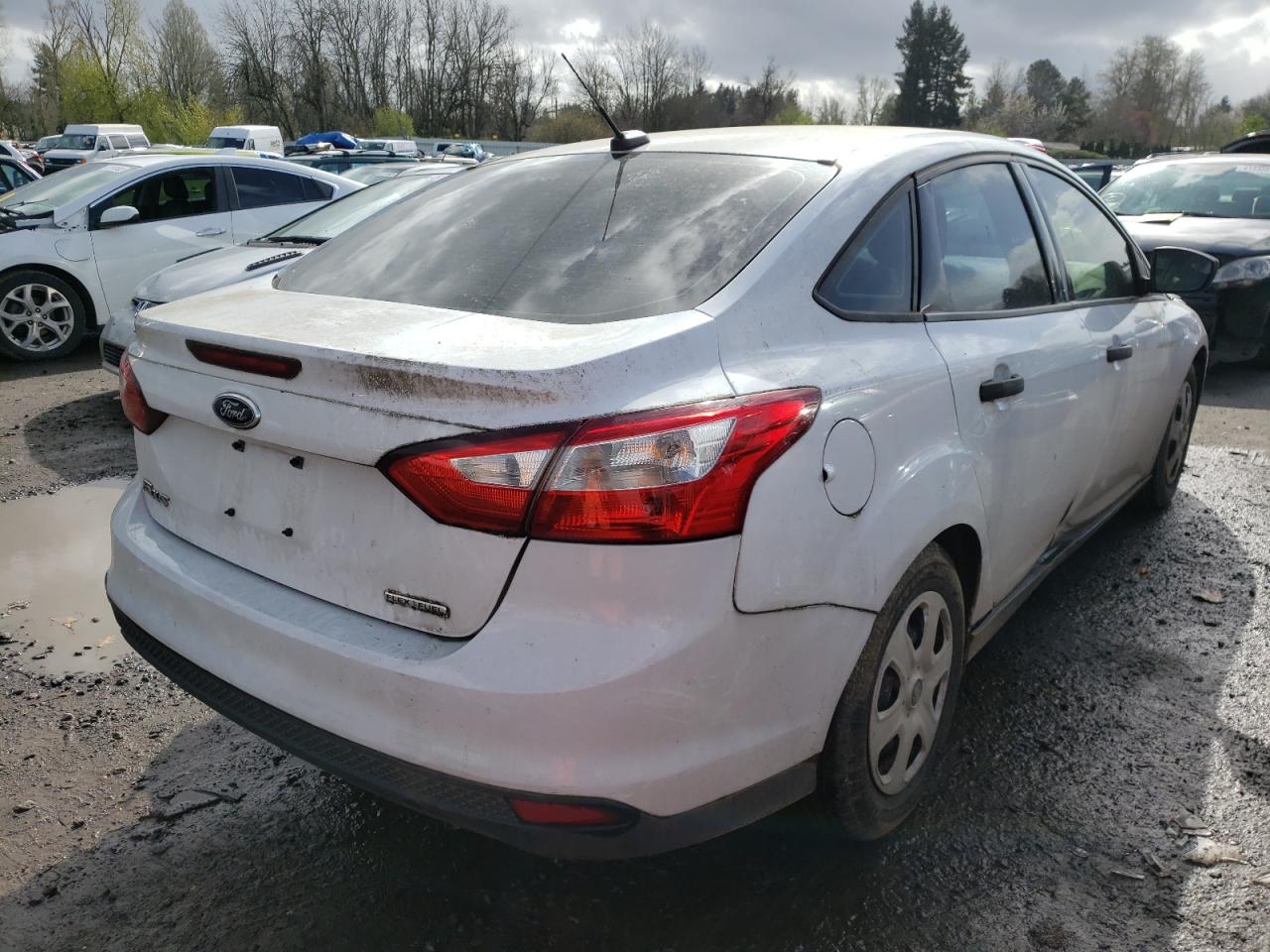 Photo 4 from auction – 2014 FORD FOCUS S with VIN 1FADP3E28EL440228