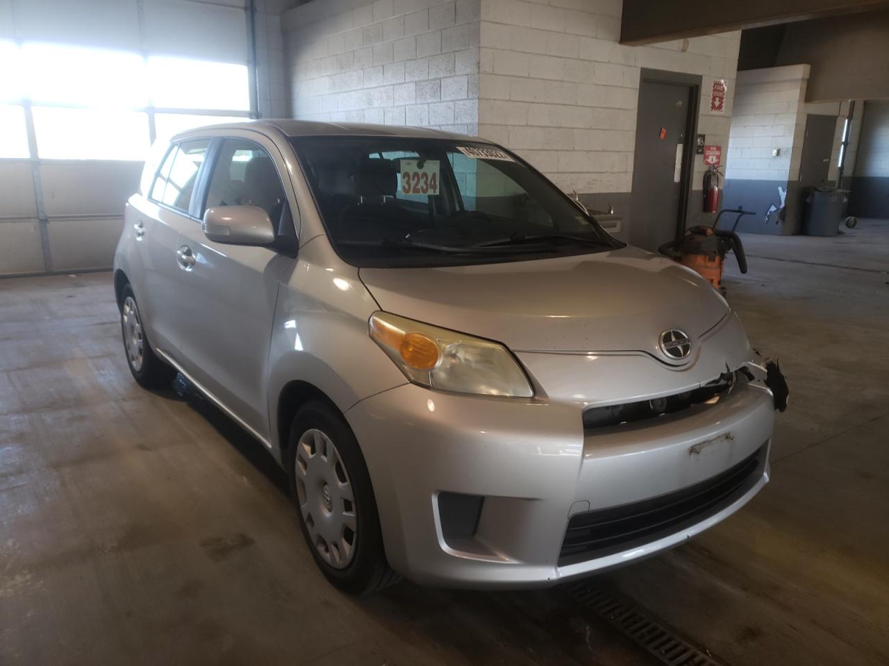 SCION XD 2009 with VIN JTKKU10499J039059 - Photo from auction
