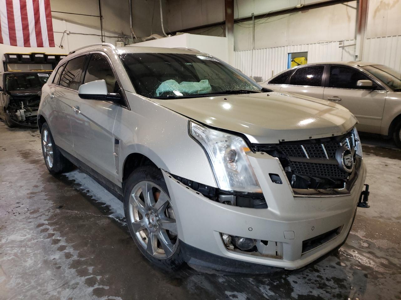 CADILLAC SRX PERFOR 2012 with VIN 3GYFNBE34CS603843 - Photo from auction