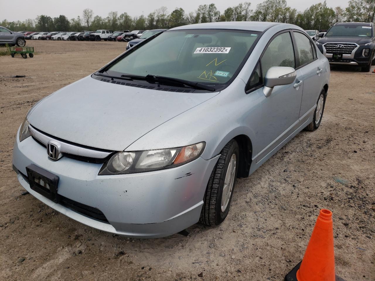 Photo 2 from auction – 2007 HONDA CIVIC HYBR with VIN JHMFA36287S004974