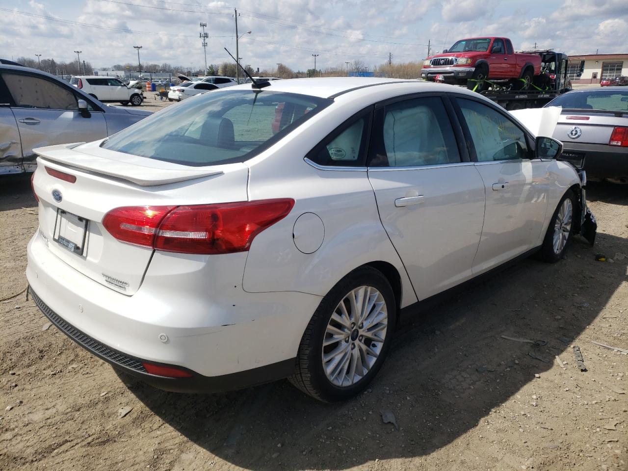Photo 4 from auction – 2016 FORD FOCUS TITA with VIN 1FADP3J23GL358917